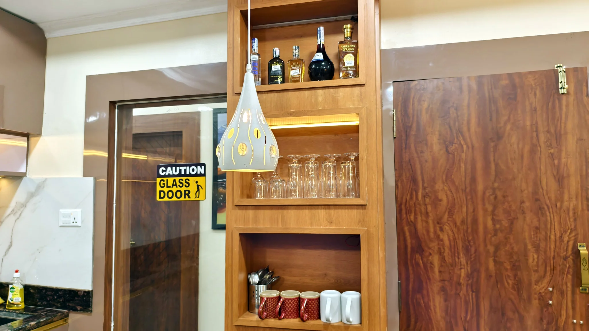 Bar shelving with spirits and glassware
