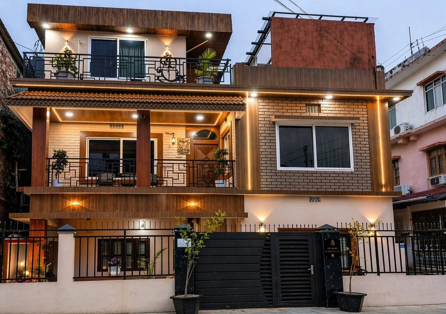 Omnia Luxe Villa facade at dusk